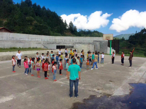 The main level of the building houses two classrooms and a community library. An outdoor playground and gathering area is located on the second level with access to the roof of the building accessible for the children to play and for villagers to rest.